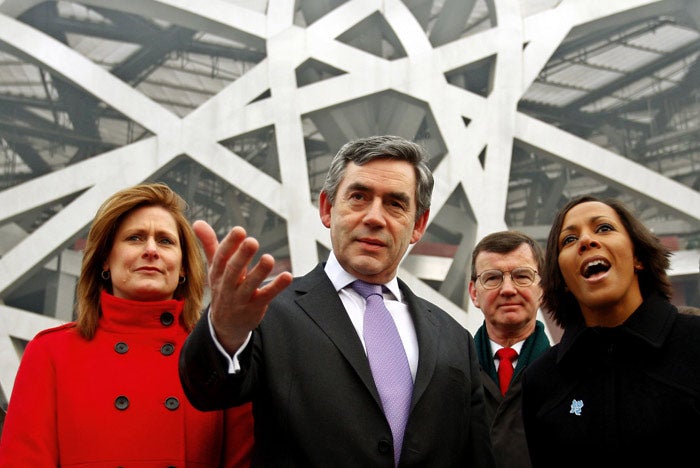 Gordon Brown with his wife, Sarah, and the Olympic gold medallist Kelly Holmes in Beijing in January