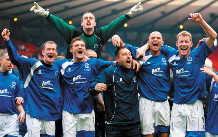 Queen of the South players celebrate reaching the club's first Cup Final
