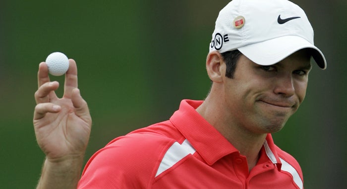 Paul Casey acknowledges the crowd's applause after picking up a birdie with a 20-foot putt at the seventh hole during his third round of 69 at Augusta yesterday