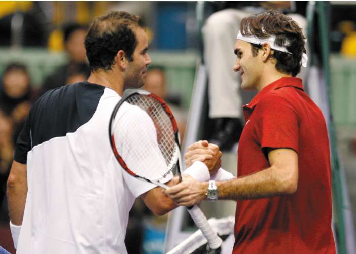 Sampras (left) after an exhibition match against world No 1 Roger Federer in Seoul, South Korea in 2007