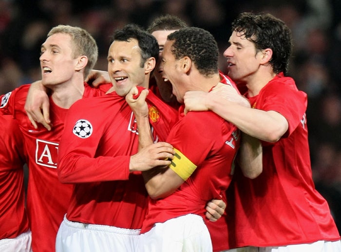 Ryan Giggs celebrates with his United team-mates after victory over Barcelona