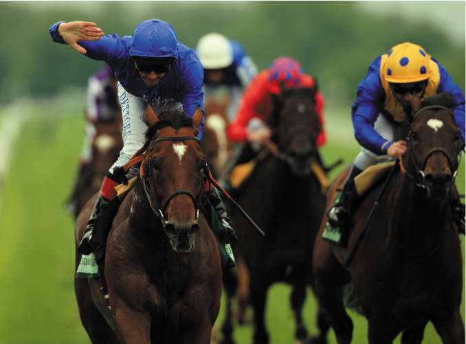 The Saeed Bin Suroor-trained Creachadoir, ridden by Frankie Dettori, lands the Lockinge Stakes at Newbury