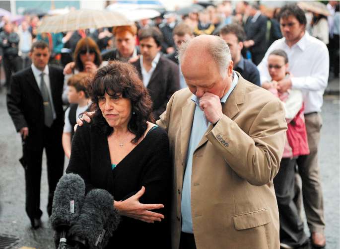 Margaret and Barry Mizen speaking to the press yesterday before the memorial service in south London for their 16-year-old son Jimmy