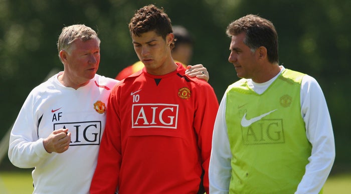 Queiroz (right) believes that the Spanish nation are trying to &quot;naturalise&quot; Cristiano Ronaldo (centre)