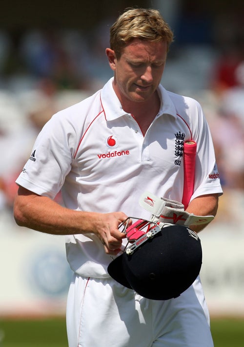 Collingwood walks off after being caught by Ross Taylor off Kyle Millsfor a duck at Trent Bridge yesterday