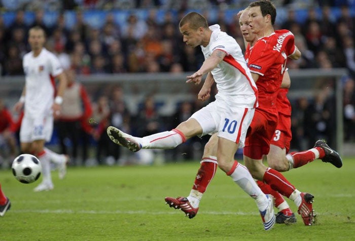 Czech this out: Vaclav Sverkos fires in the first goal at Euro 2008, and the only goal of the game, as the Czech Republic secure an undeserved victory over Switzerland in Basel © Reuters