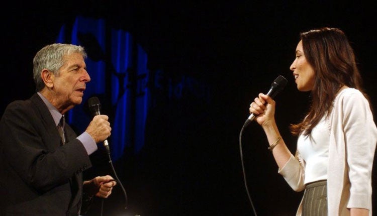 Cohen sings with his partner Anjani Thomas last year © AP