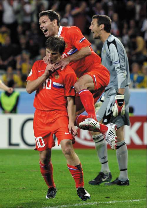 Andrei Arshavin celebrates after scoring Russia's second goal against Sweden