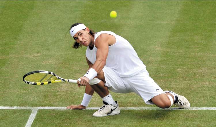 Nadal, the No 2 seed, plays a backhand during his 6-4, 6-4, 7-6 victory over Andreas Beck