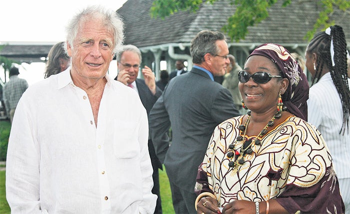 Island life: Chris Blackwell with Rita Marley, the widow of Bob Marley, in Jamaica earlier this year [URBANIMAGE.TV/ADRIAN BOOT; CHRIS JACKSON/GETTY IMAGES; HULTON/GETTY IMAGES]