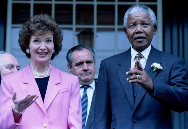 Robinson pictured with Nelson Mandela in 1996 when she was serving as president of Ireland