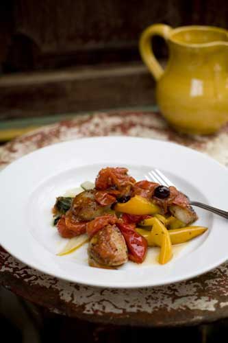 Arrange the peppers and chard on a plate and lay the scallops on top