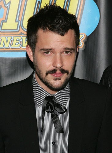 Brandon Flowers of The Killers back in the days when he sported a beard and mustache