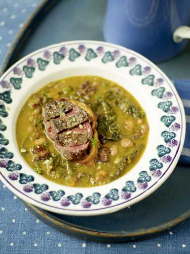 Ladle the soup into bowls, lay a slice of toast on top and place a pigeon breast on the toast