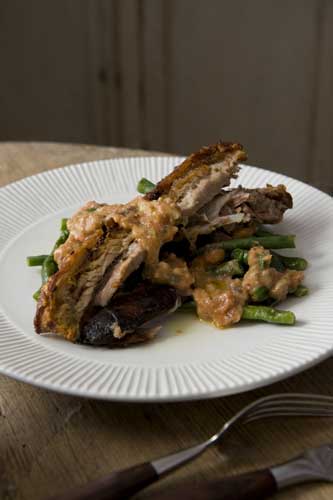 Serve while piping hot with the beans