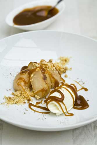 Garnish with a pinch of mixed spice on the plate and serve with the warm caramel sauce