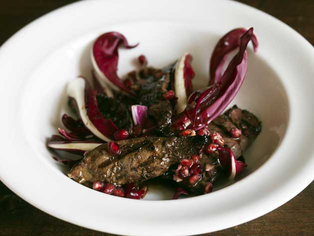 The bitterness of the leaves works in perfect harmony with the liver and pomegranates.