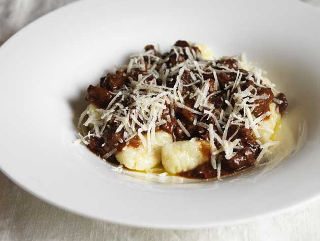 Serve in warmed pasta bowls or plates with the sauce spooned over the gnocchi