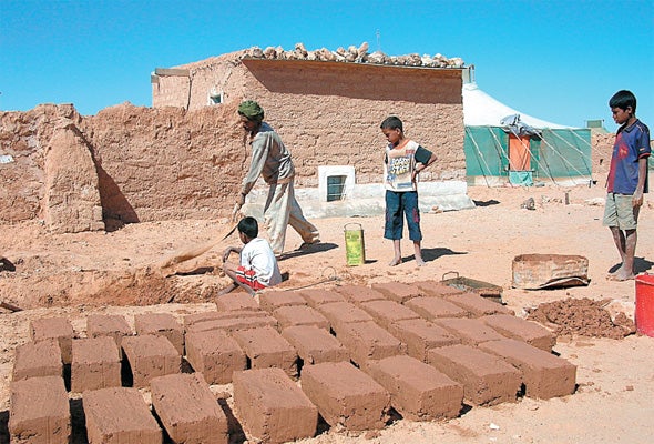 Building a future: RedR's projects have included well digging and strengthening in Aceh, Indonesia, building water storage tanks in Aceh, and construction in Western Sahara, Africa (above)