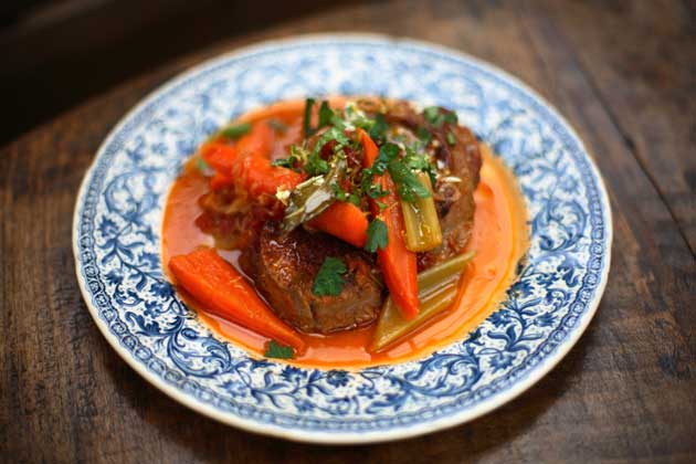 To serve, spoon the meat and sauce on to a warmed serving plate and scatter over the gremolata.