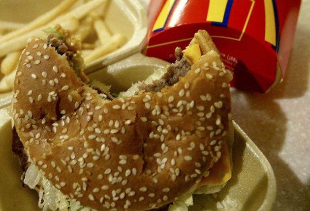 The young couple noticed the surprise green ingredient as soon as they tasted their McDouble meal at a branch in Iowa