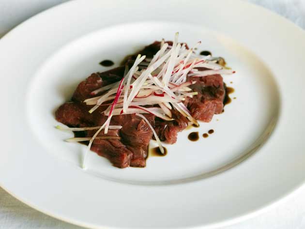 Spoon the pomegranate molasses over the beef and scatter over the mooli