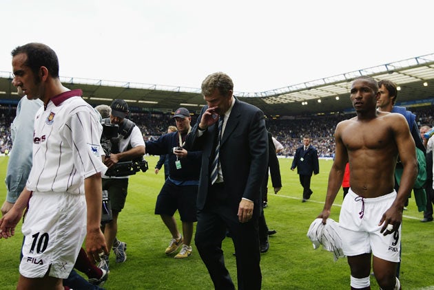 Defoe (right) pictured after West Ham's relegation in 2003