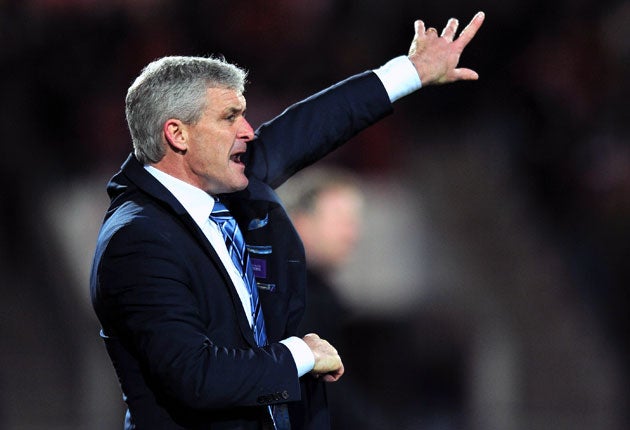 City manager Mark Hughes is on the verge of signing Emmanuel Adebayor from Arsenal