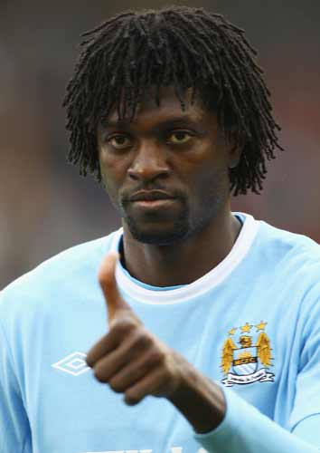 Emmanuel Adebayor celebrated in front of the Arsenal fans