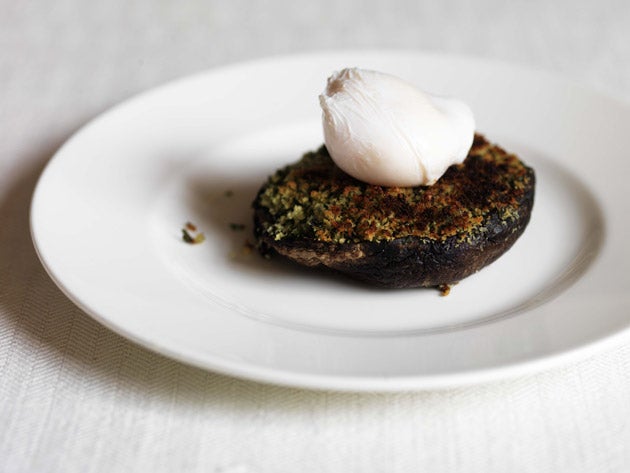 Place the poached duck egg in the centre of the mushroom and serve