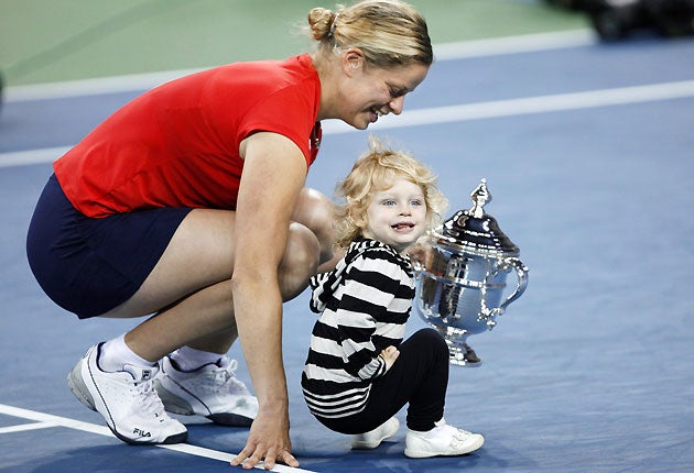 Kim Clijsters, pictured with daughter Jada in New York after winning last year's US Open