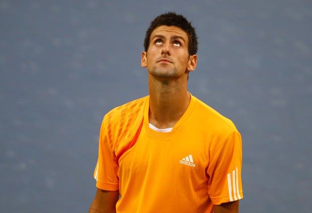 Novak Djokovic has worked with Todd Martin on his volley game. 'Some day I hope it will work into my routine that I get into the net naturally, without having to force myself'