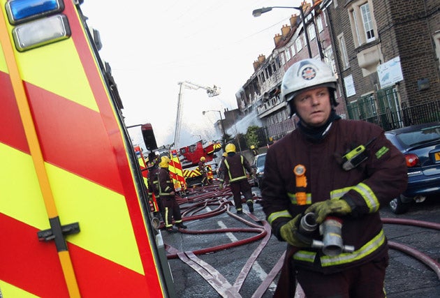 Firefighters tackle a blaze