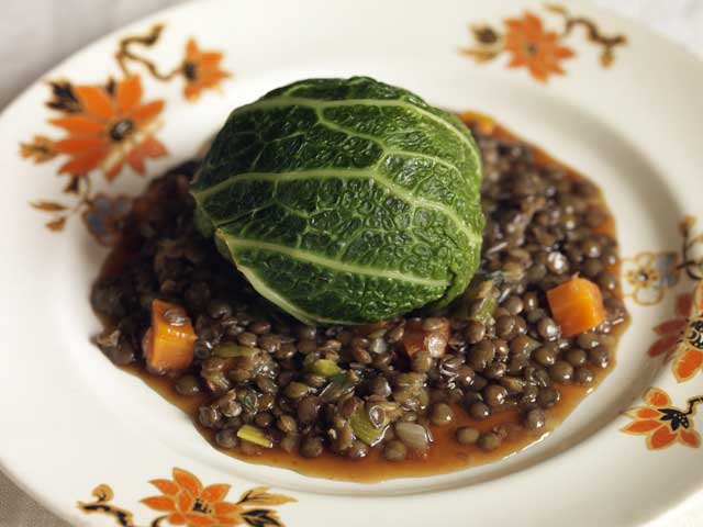 The cabbage acts as a casing for the pork filling in this classic, hearty French peasant dish