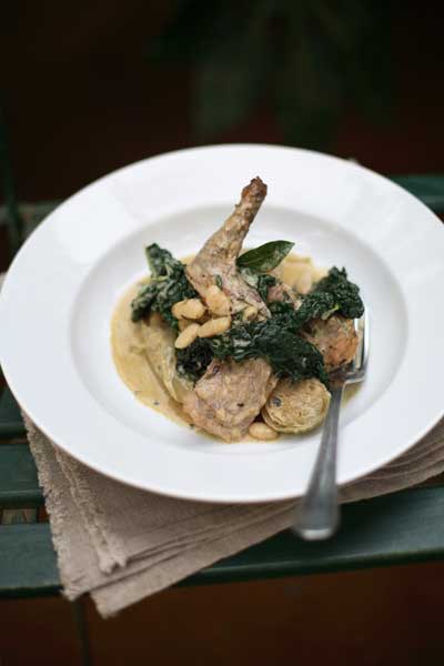 Arrange the rabbit and vegetables on a large, warm plate and spoon over the sauce