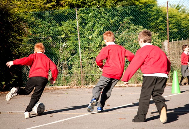 Boys playing football