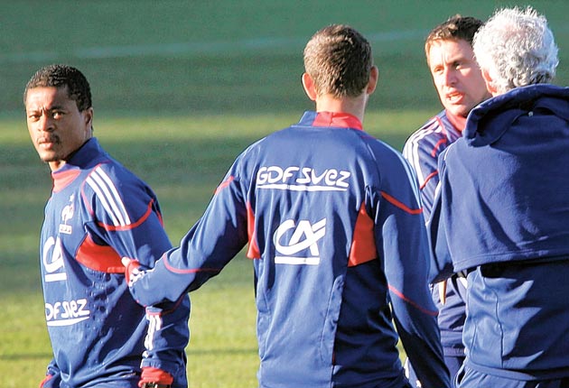 Evra (left) led the walkout at the World Cup