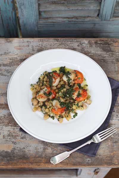 Spoon the chickpeas on to a plate, lay the scallops on top and pour over the green sauce