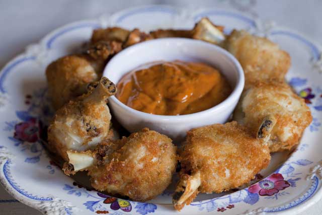 Serve fried chicken wings with a homemade dipping sauce