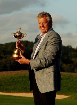 Colin Montgomerie hoists the Ryder Cup after Europe's victory earlier this month