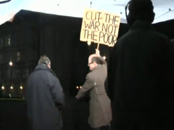 Nick Robinson was caught on camera grabbing and smashing a protester's placard after filming a report