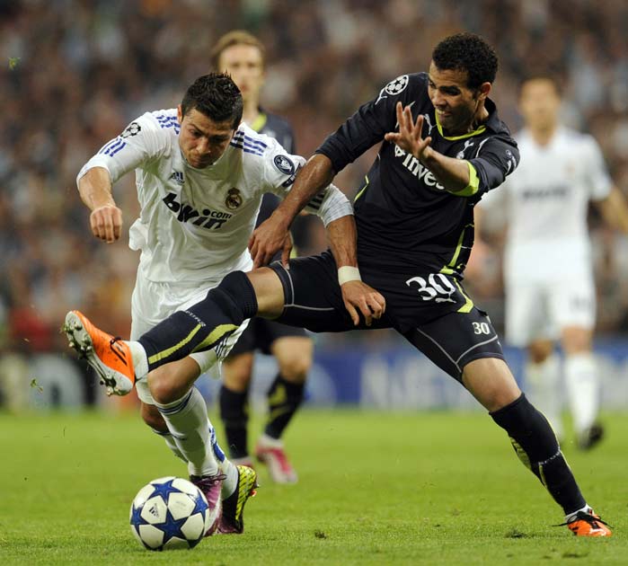 There are fears Sandro (right) may have ruptured his meniscus and could require surgery