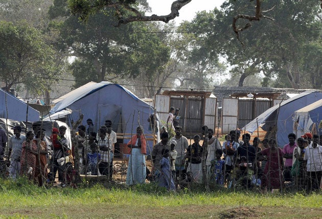 Sri Lankan Tamils captured by government forces and held in a camp for displaced people in the northern district of Vavuniya in 2009