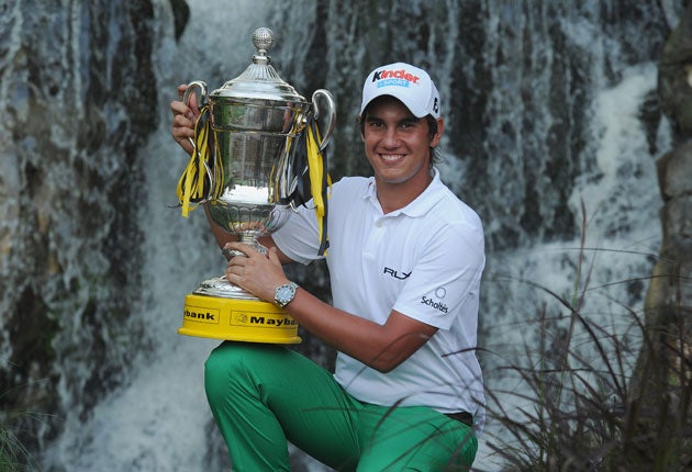 Matteo Manassero held off challenges from Gregory Bourdy and Rory McIlroy to win the 2011 Maybank Malaysian Open