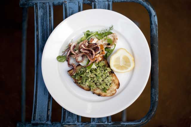 Serve with a wedge of lemon and a scattering of the fennel fronds