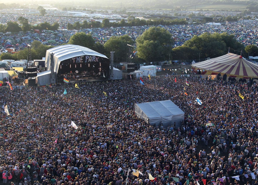 Festival-goers watch Pulp perform on the Park Stage in 2011