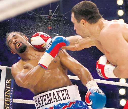 David Haye is caught by a right hook from Wladimir Klitschko in Hamburg