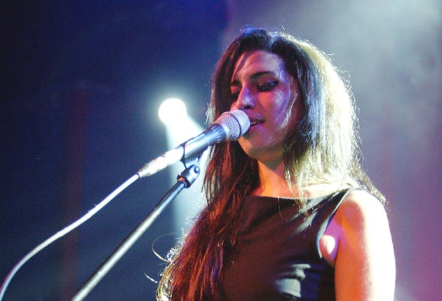 Amy Winehouse on stage at the Bristol Academy in 2004 (Getty)