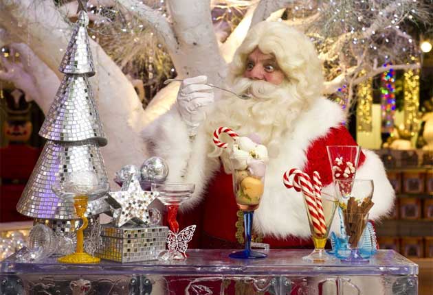 Father Christmas tastes the 12 ice-creams of Christmas at the opening of Harrods Christmas World department (Getty Images)