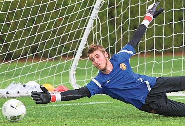 United's £18.9m summer buy David de Gea gets the feel of his new shirt